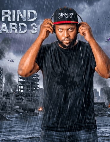 A man stands in a stom with a black cap, blue denim jeans, black t-shirt, hold black headphones with a intense look on his face. While ECU East Care Helicopter fly over him and stuff on fire and destruction for Renaldo Creative's Grind Hard 3 (Instrumental) Album.