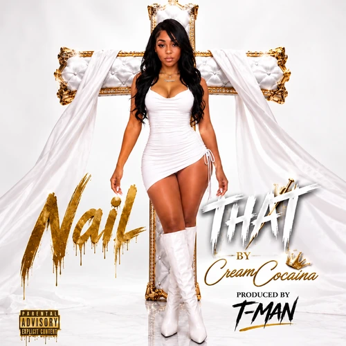 A beautiful afro latina woman stands in front of a gold and silver cross in with long black hair, coke shape body, short white dress, white boots on a white background. The text says Creame Cocaina Nail That produced by T-Man. This is promo for Cream Cocaina new single Nail That.
